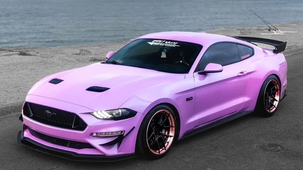 Ford Mustang fitted with a Street Aero front splitter and side skirt splitters, photographed from the front three quarter angle